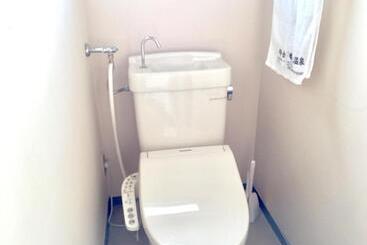 هتل Backpackers Dorms Miwa Hostel