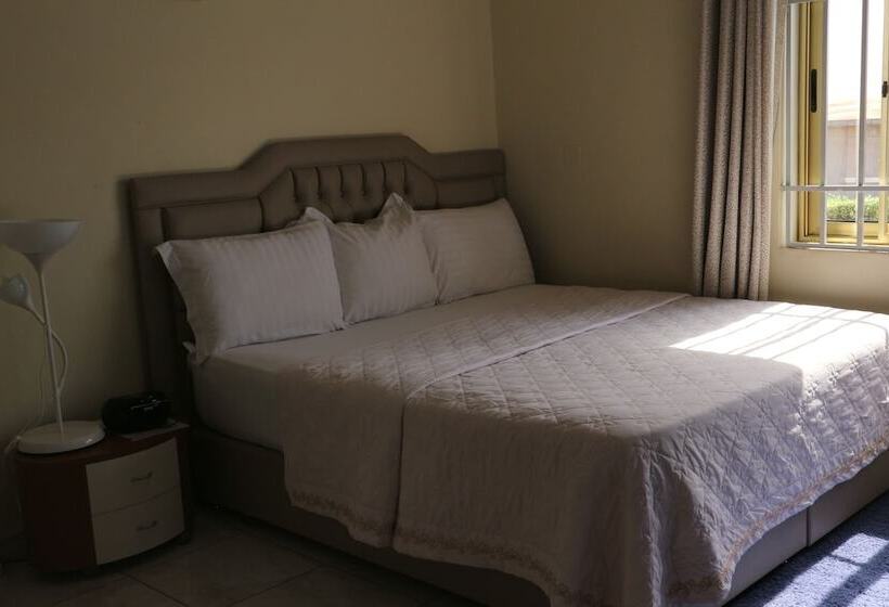 Отель Magnolia Lodge
