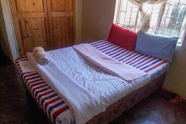 پانسیون Jojomo Guest House