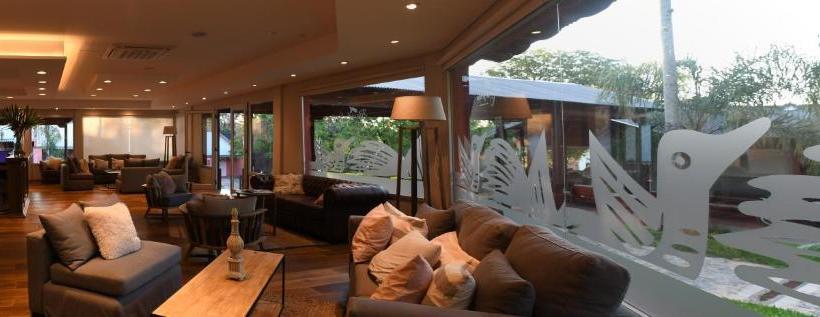 Río Arriba Suites & Apartments & Restó