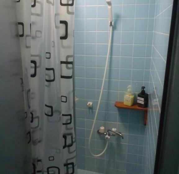 بنسيون Kerama Backpackers