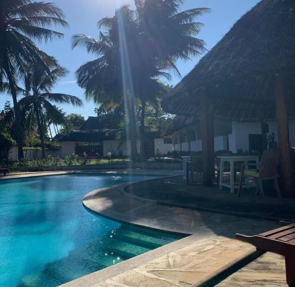 تختخواب و صبحانه Peekaboo Diani Beach