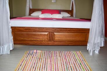 تختخواب و صبحانه Tahira Villa