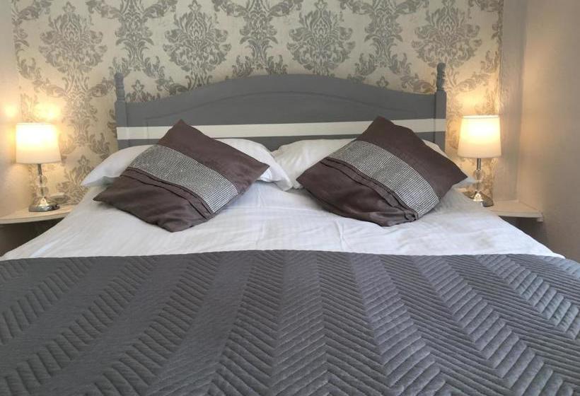 مبيت وإفطار Three Palms