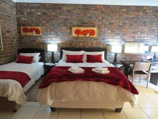 بنسيون Coral Tree Guest Rooms