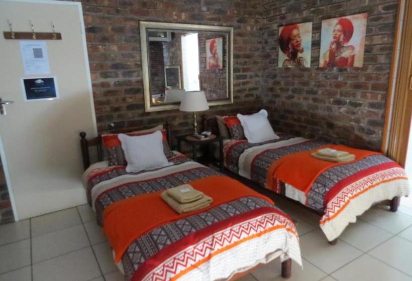 بنسيون Coral Tree Guest Rooms