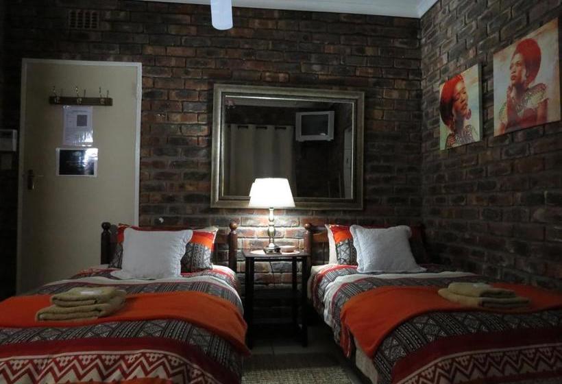 بنسيون Coral Tree Guest Rooms