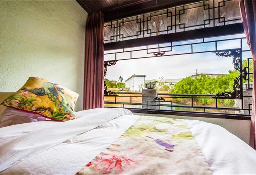 Пансион Lijiang Taoyuan Inn