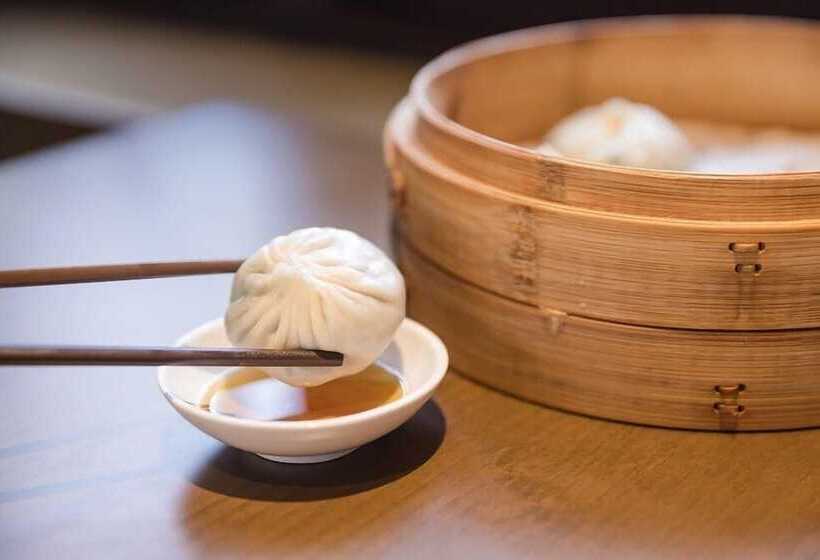 Отель Howard Johnson New District Plaza Ziyang