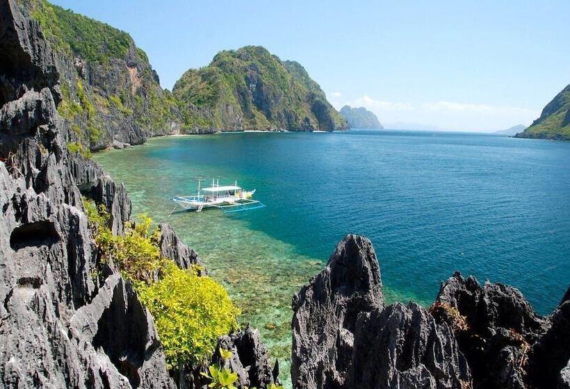 בית מלון כפרי Pangulatan Beach Resort