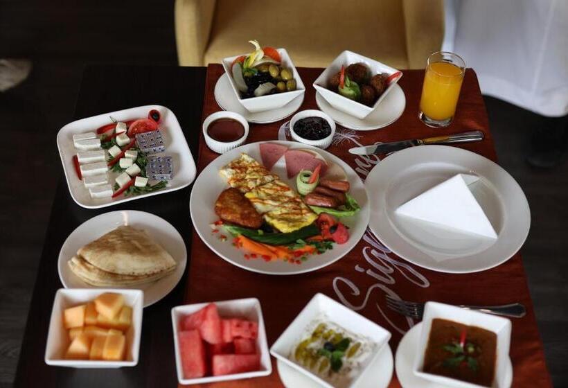 Fotos del hotel Signature:  21