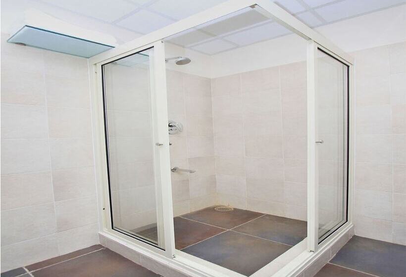 Fotos del hotel Capital O 13090 Astor:  8