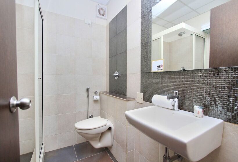 Fotos del hotel Capital O 13090 Astor:  9