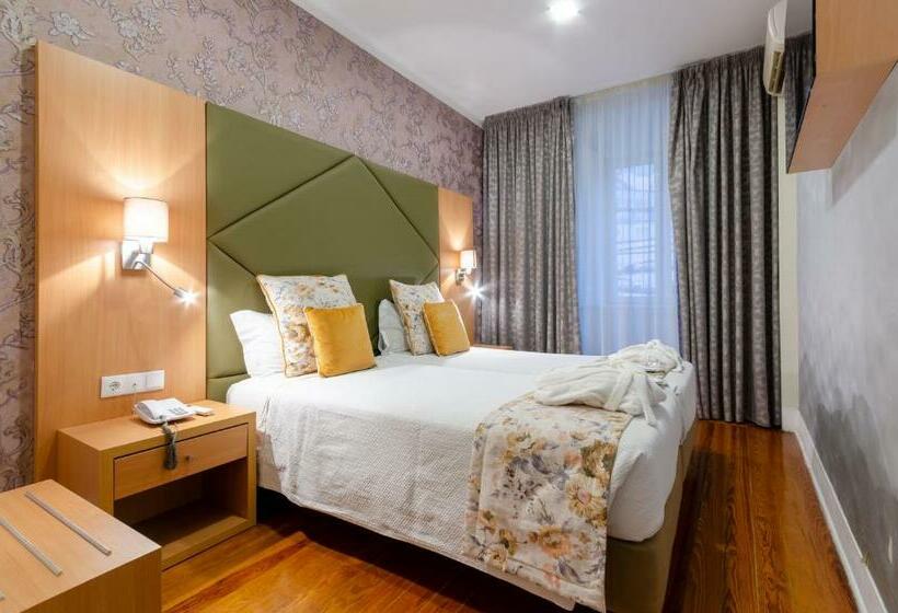 Quarto superior, Inn Rossio