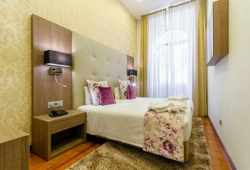 Quarto Superior, Inn Rossio