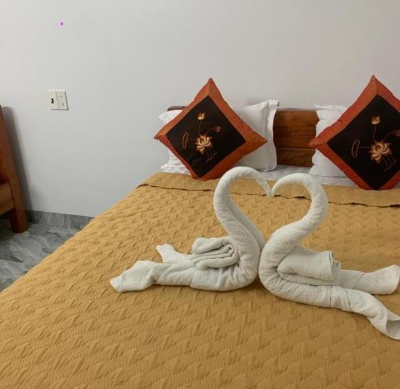 اتاق استاندارد چهارنفره با چشمانداز باغ, Tam Coc White Swan Homestay