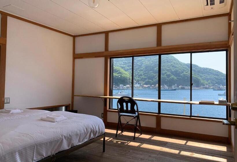 اتاق استاندارد با چشم‌انداز دریا, Tagore Harbor Hostel