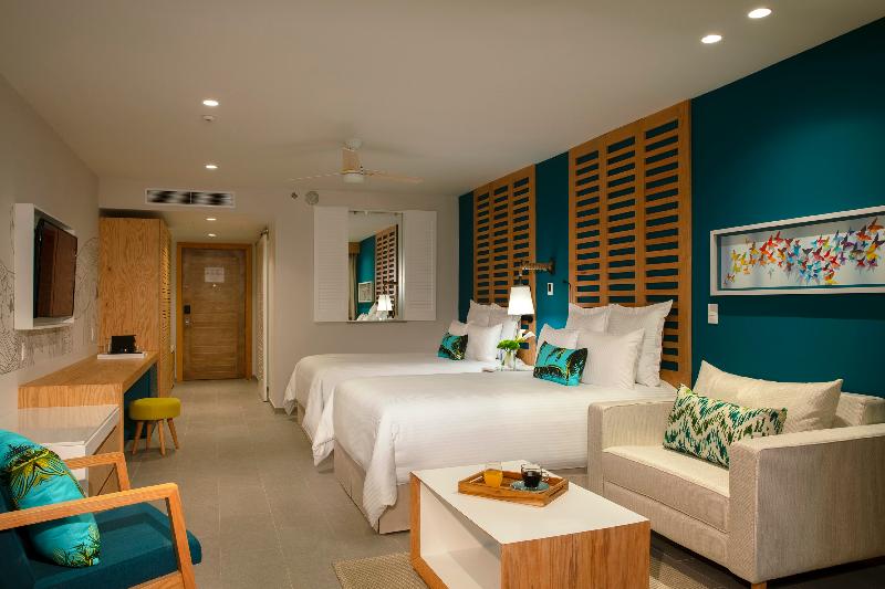 سوییت جونیور با چشم‌انداز جانبی دریا, Dreams Natura Resort & Spa  All Inclusive