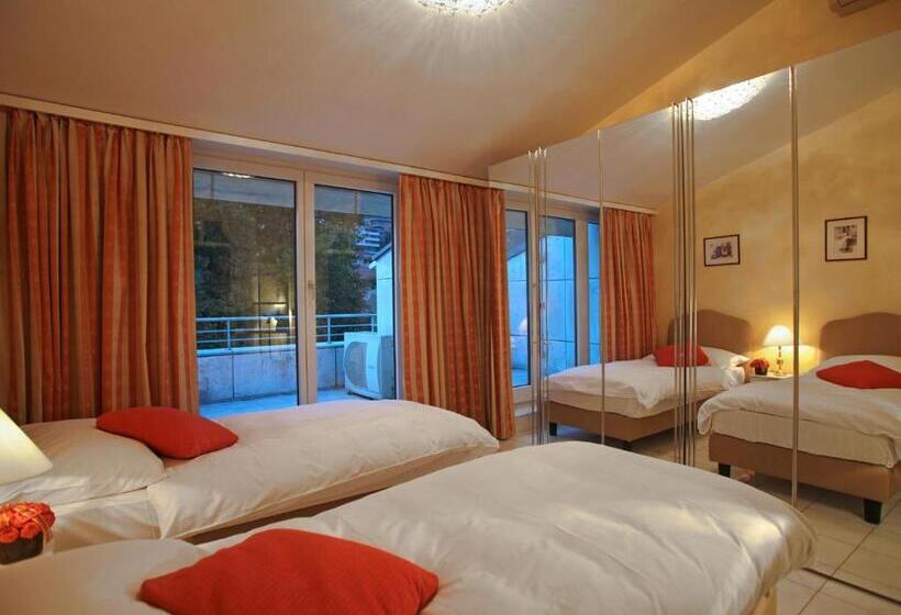 Suite with lake view, Villa Sassa