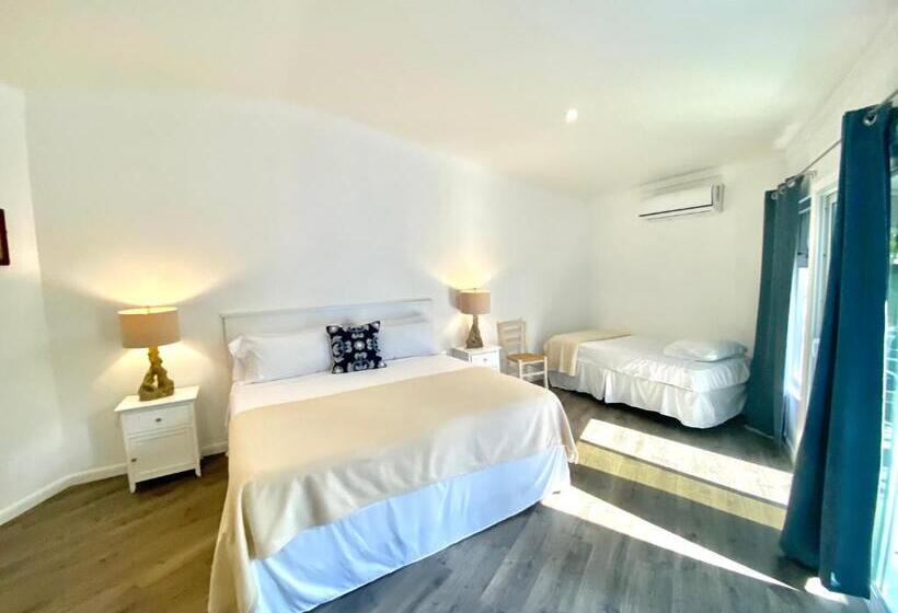 اتاق استاندارد سه تخته با چشم‌انداز باغ, The Sunset Cove And Rainbow Room