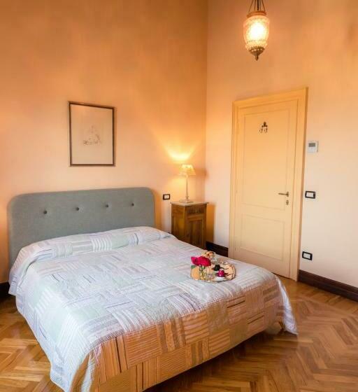 آپارتمان یک خوابه با دری مشترک که هال را جدا می کند., B&b Villa Nichesola