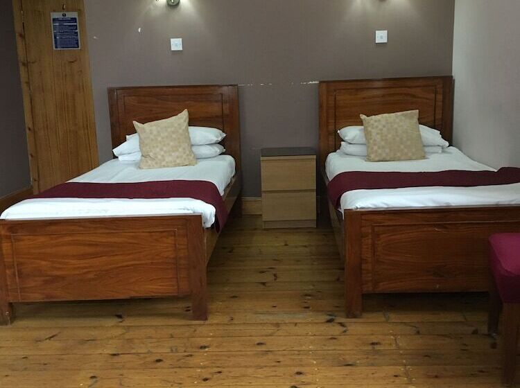 اتاق استاندارد چهار تخته, Merchant City Inn