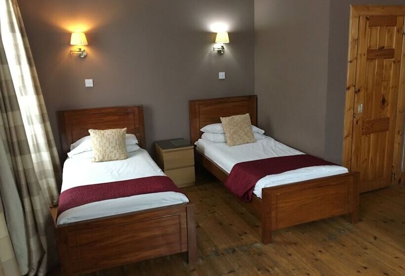 اتاق استاندارد چهار تخته, Merchant City Inn