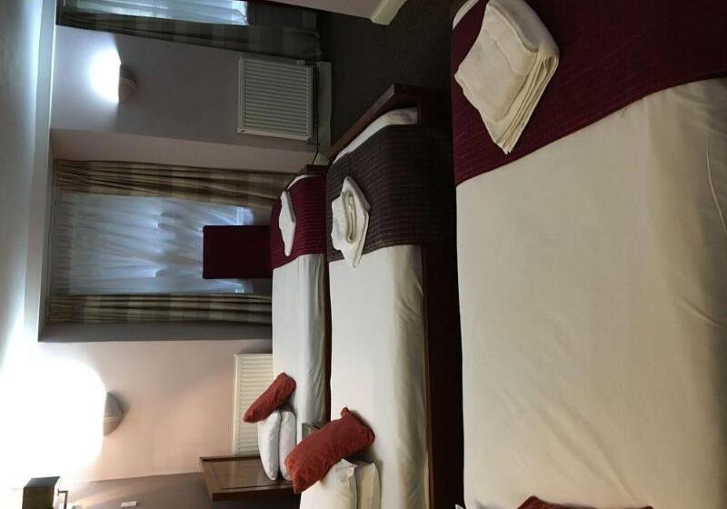 اتاق استاندارد چهار تخته, Merchant City Inn
