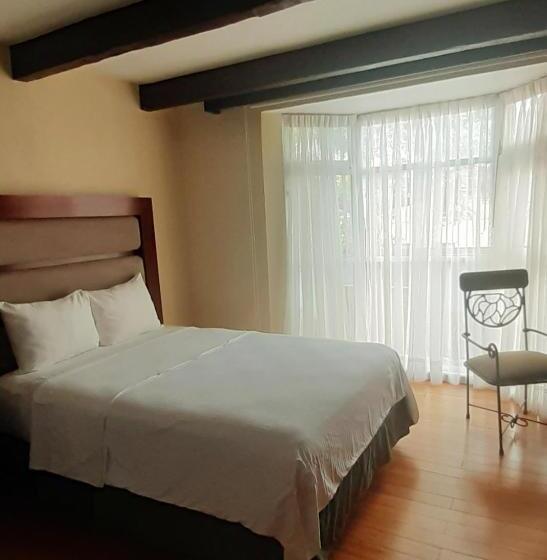 Habitación Deluxe Cama King, Es Villa Mercedes San Cristobal