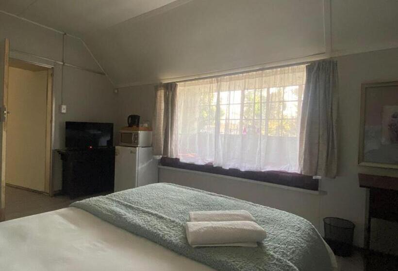 اتاق استاندارد با چشم‌انداز باغ, Ndzuti Guest House