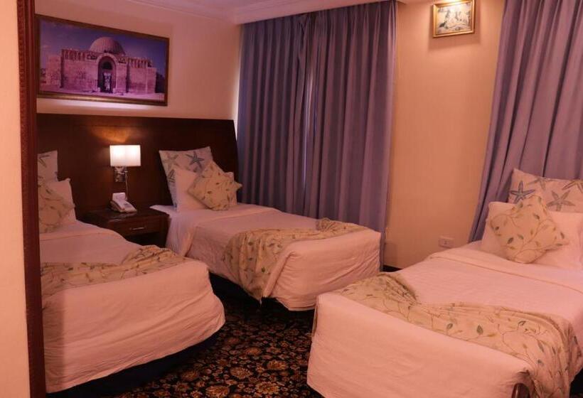 Quarto Triplo Standart, Amra Palace International