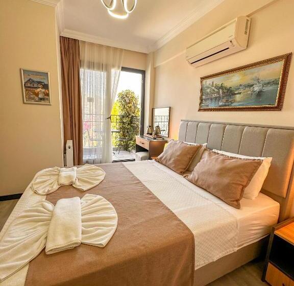 اتاق لوکس با بالکن و چشم‌انداز دریا, Mykonut Boutique Suites