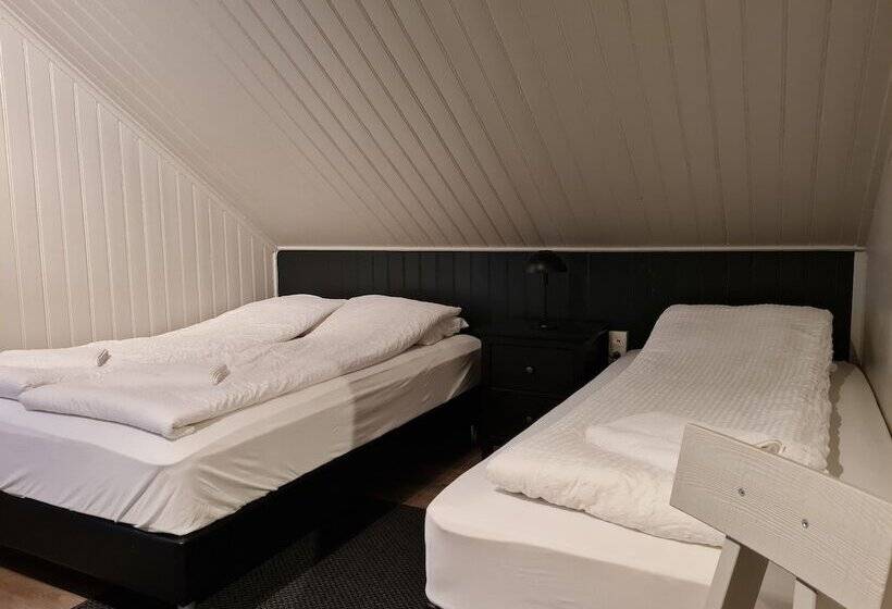 اتاق استاندارد سه تخته با سرویس بهداشتی مشترک, Lava Guesthouse