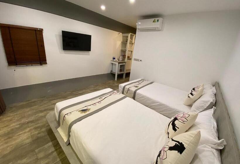 اتاق استاندارد سه تخته با چشم‌انداز باغ, Homestay Papa Garden
