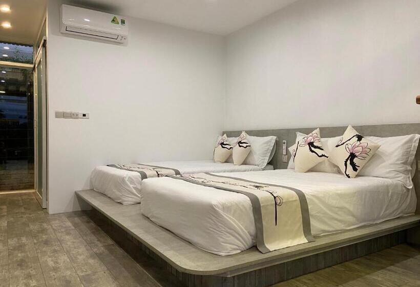 اتاق استاندارد سه تخته با چشم‌انداز باغ, Homestay Papa Garden