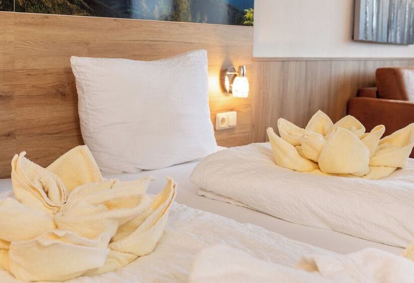 اتاق راحتی سه تخته, Alpenhotel Dachstein