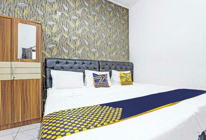 Economy Triple Room, Spot On 91521 Mayong Guesthouse