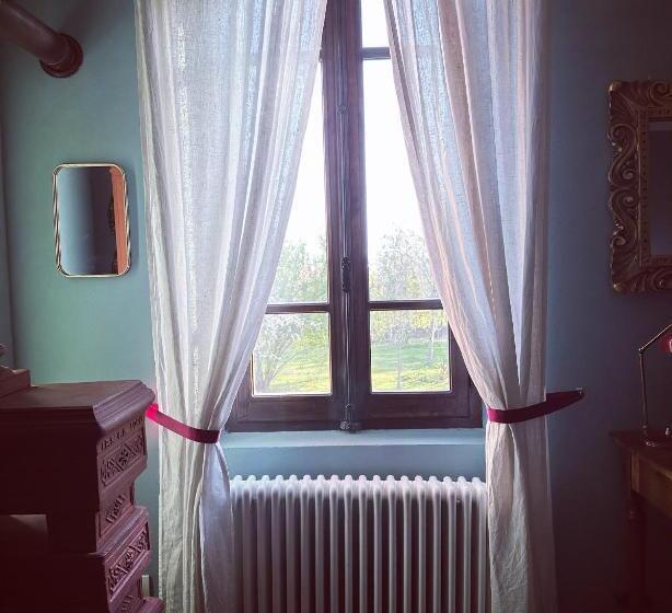 سوییت با چشم‌انداز باغ, B&b Podere Merlo