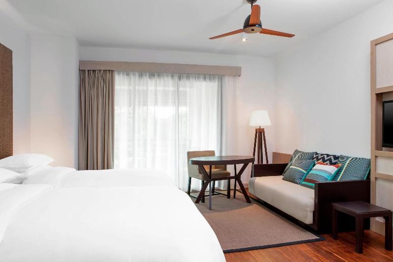 اتاق استاندارد با بالکن و چشم‌انداز باغ, Sheraton New Caledonia Deva Spa & Golf Resort
