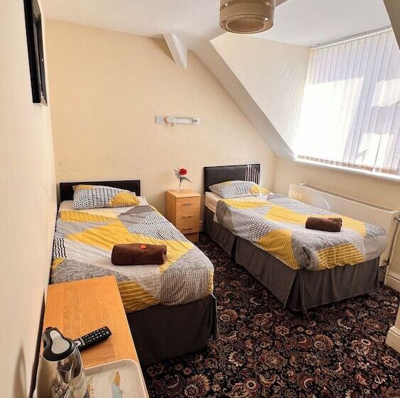 اتاق استاندارد با سرویس بهداشتی مشترک, Castle Lodge Guest House 86 88 Sheil Rd L6 3af