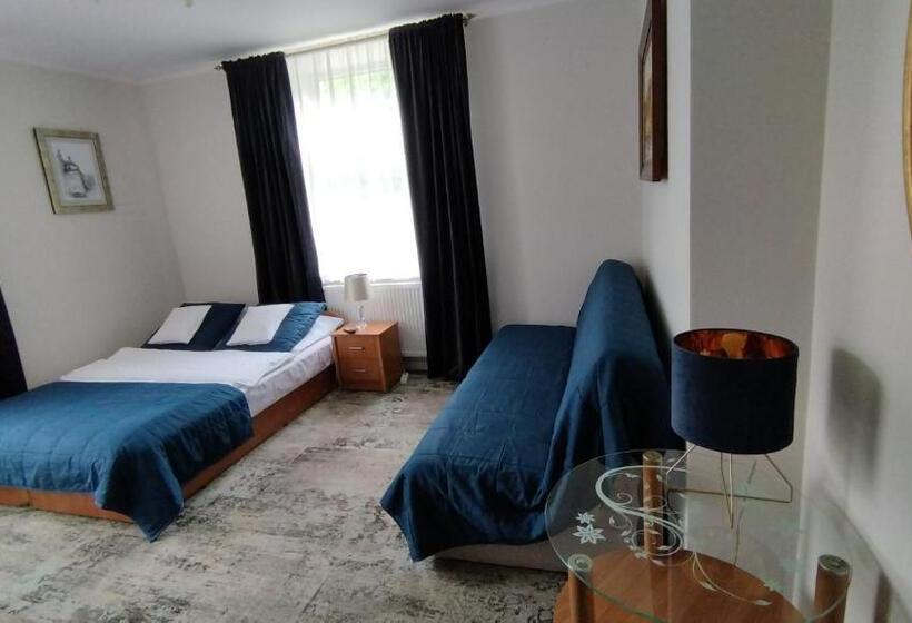اتاق استاندارد چهارنفره با چشم‌انداز باغ, Apartamenty I Pokoje Gościnne Kołodziejówka