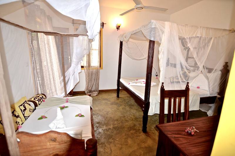 اتاق استاندارد سه تخته با چشم‌انداز باغ, Sahari Zanzibar