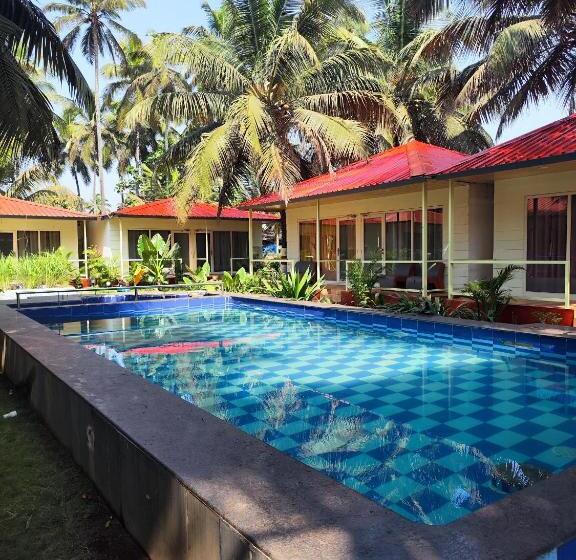 اتاق استاندارد با چشم‌انداز استخر, The Sunbliss Cottages