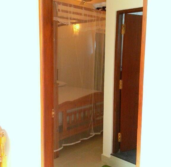اتاق استاندارد سه نفره, Nooit Gedacht Holiday Resort Unawatuna