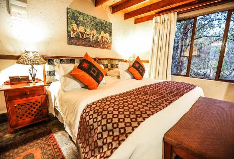 اتاق لوکس چهار تخته, Grand Kruger Lodge And Spa