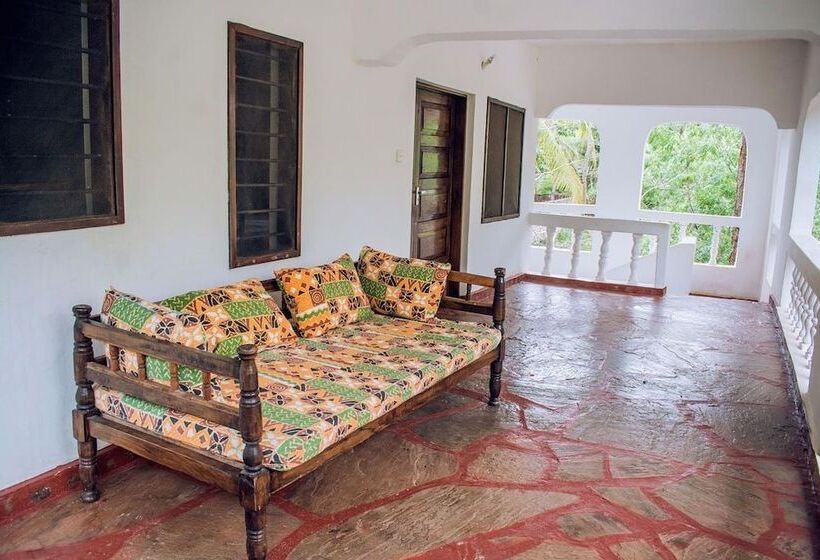 تختخواب در اتاق مشترک, Kijani Cottages