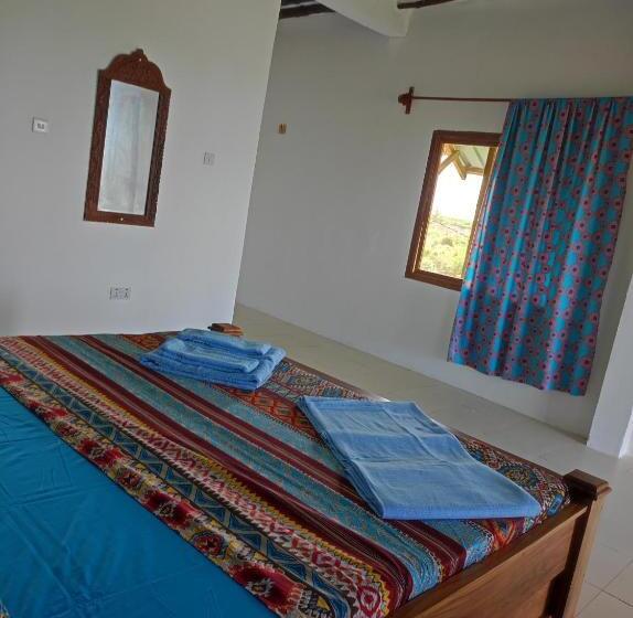 اتاق لوکس با بالکن و چشم‌انداز دریا, Secret Place Hotel By Hello Tanzania Tours& Safaris