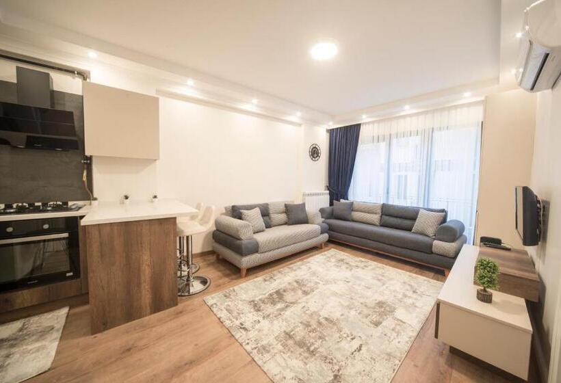 سوییت لوکس, Saygın Apartments