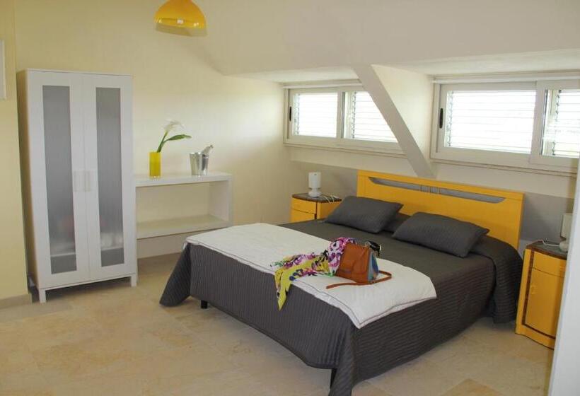 اتاق استاندارد چهارنفره با چشم‌انداز باغ, Sicilia Bedda B&b