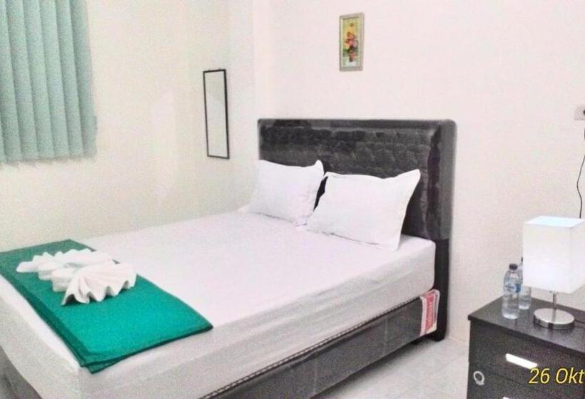 Economy Quadruple Room, Balige J&j Guest House 2